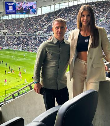 Anna Rebrova with her husband Serhiy Rebrov in the stadium during Shakhtar Vs. Tottenham